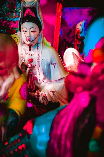 colorful interpretation of gods statues found in the wild of Hong Kong